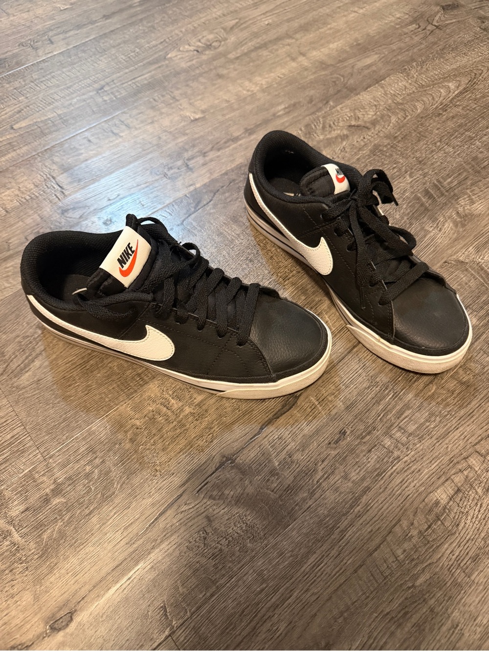 Nike Black and White Men's Low-Top Sneakers with White Swoosh